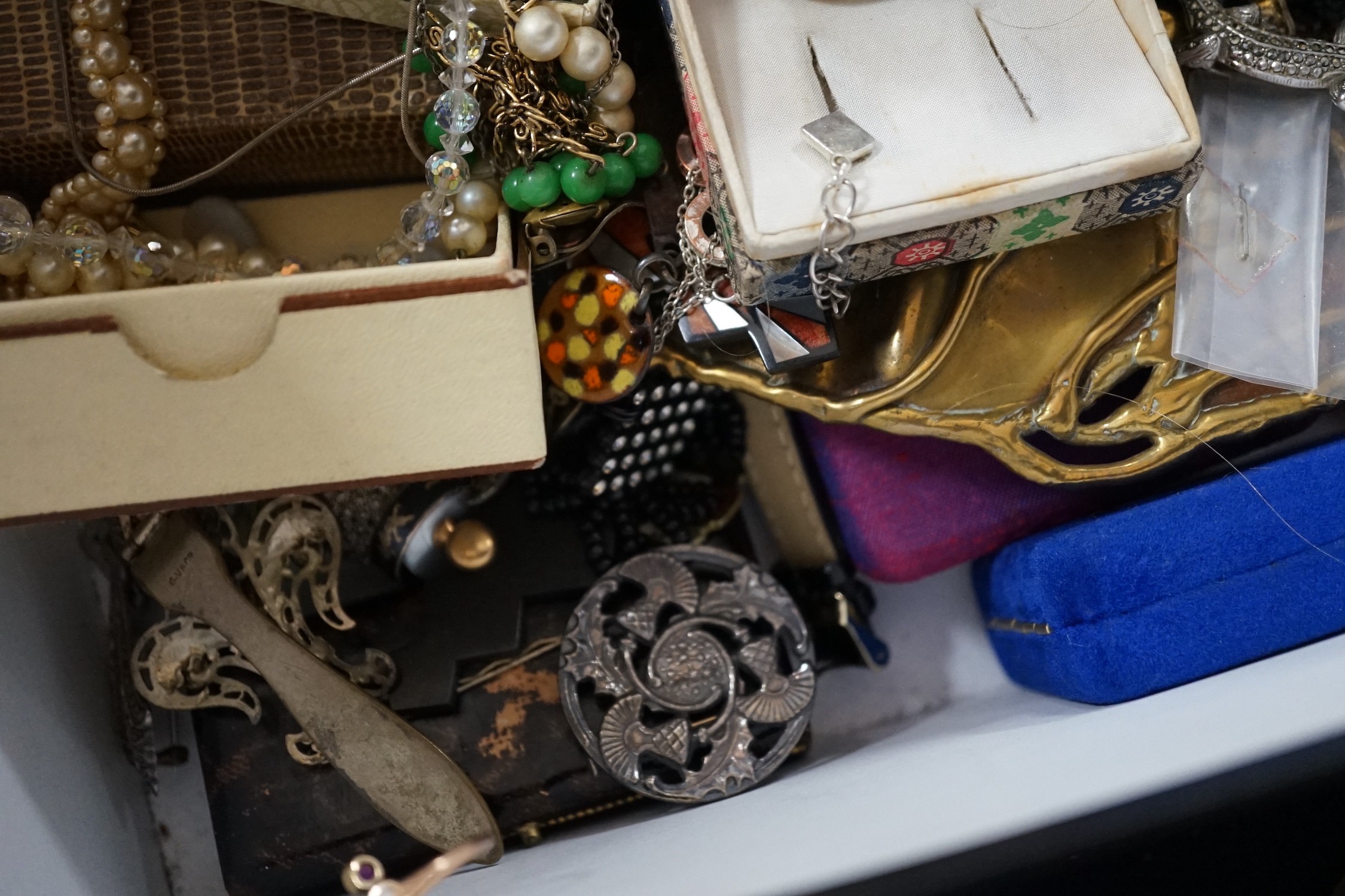 A yellow metal and gem set ring and a large quantity of assorted costume jewellery.